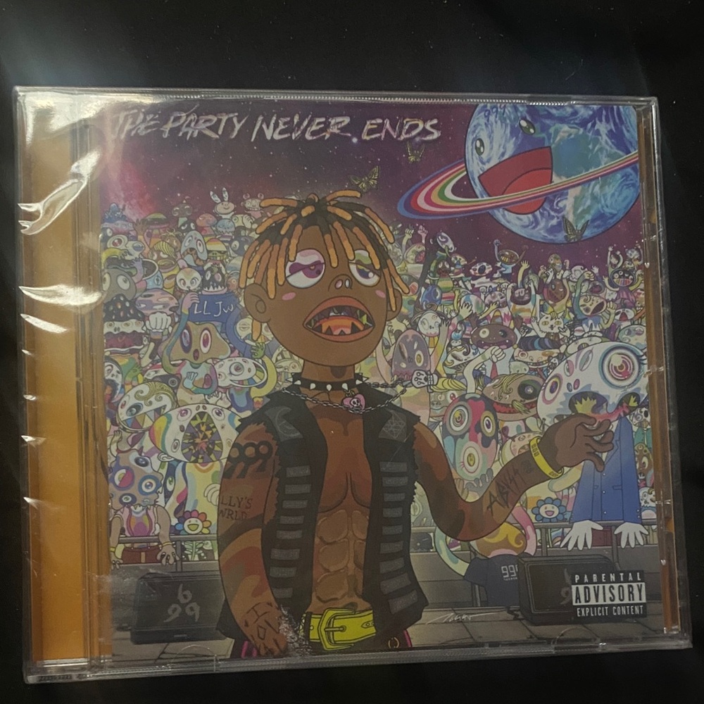 Vibrant 'The Party Never Ends' CD with Colorful Cover Art